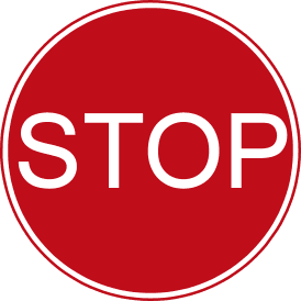 Stop before or at the sign.