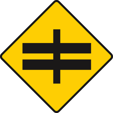 Crossroads with dual carriageway ahead.