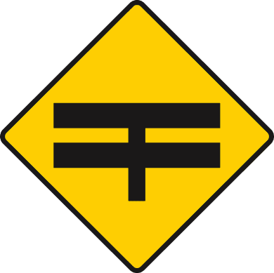 T-junction with dual carriageway ahead.