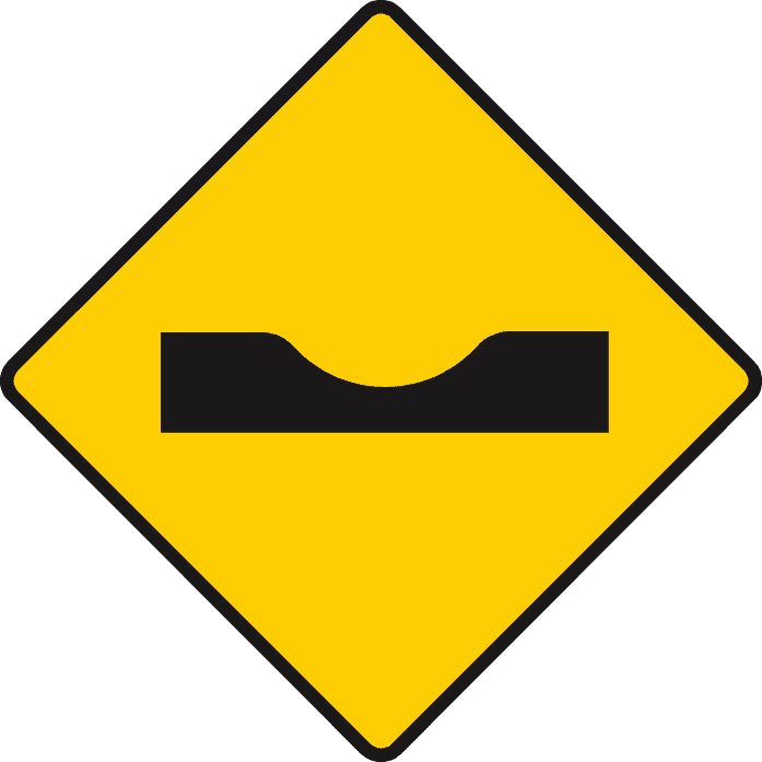 Sharp depression or dip ahead.